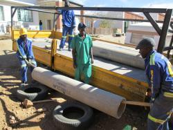 Preparing to improve the drainage of the erf